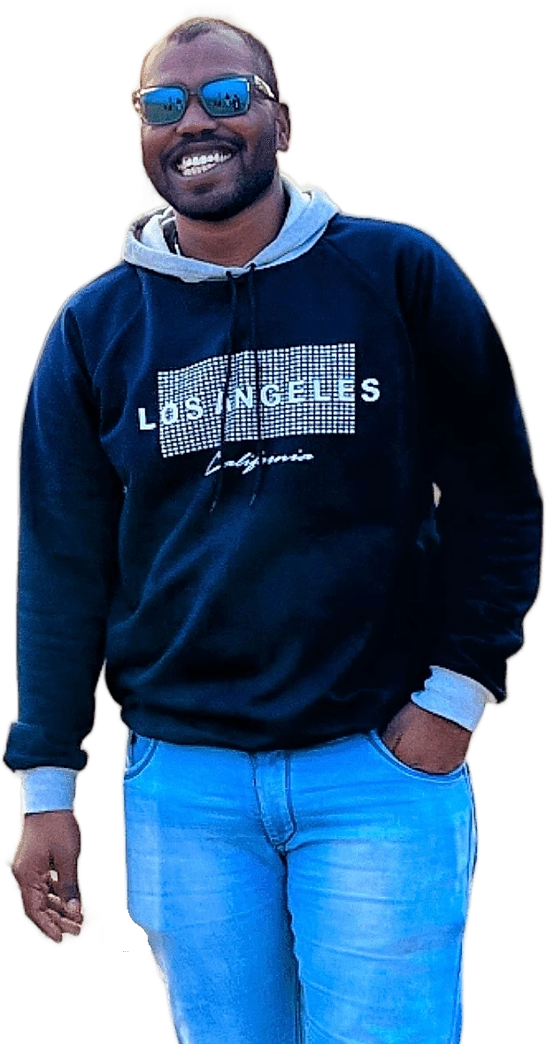 Amol Tribhuwan in a navy sweatshirt, smiling